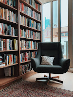 A bookshelf and reading chair