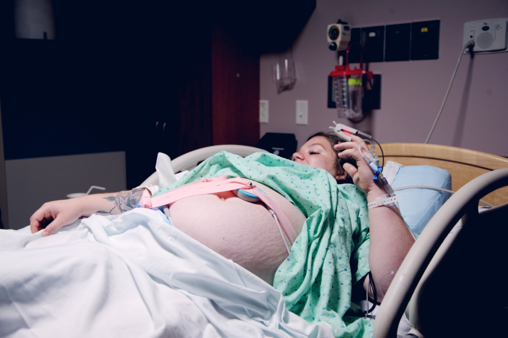 Pregnant woman lying down in a hospital