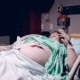 Pregnant woman lying down in a hospital